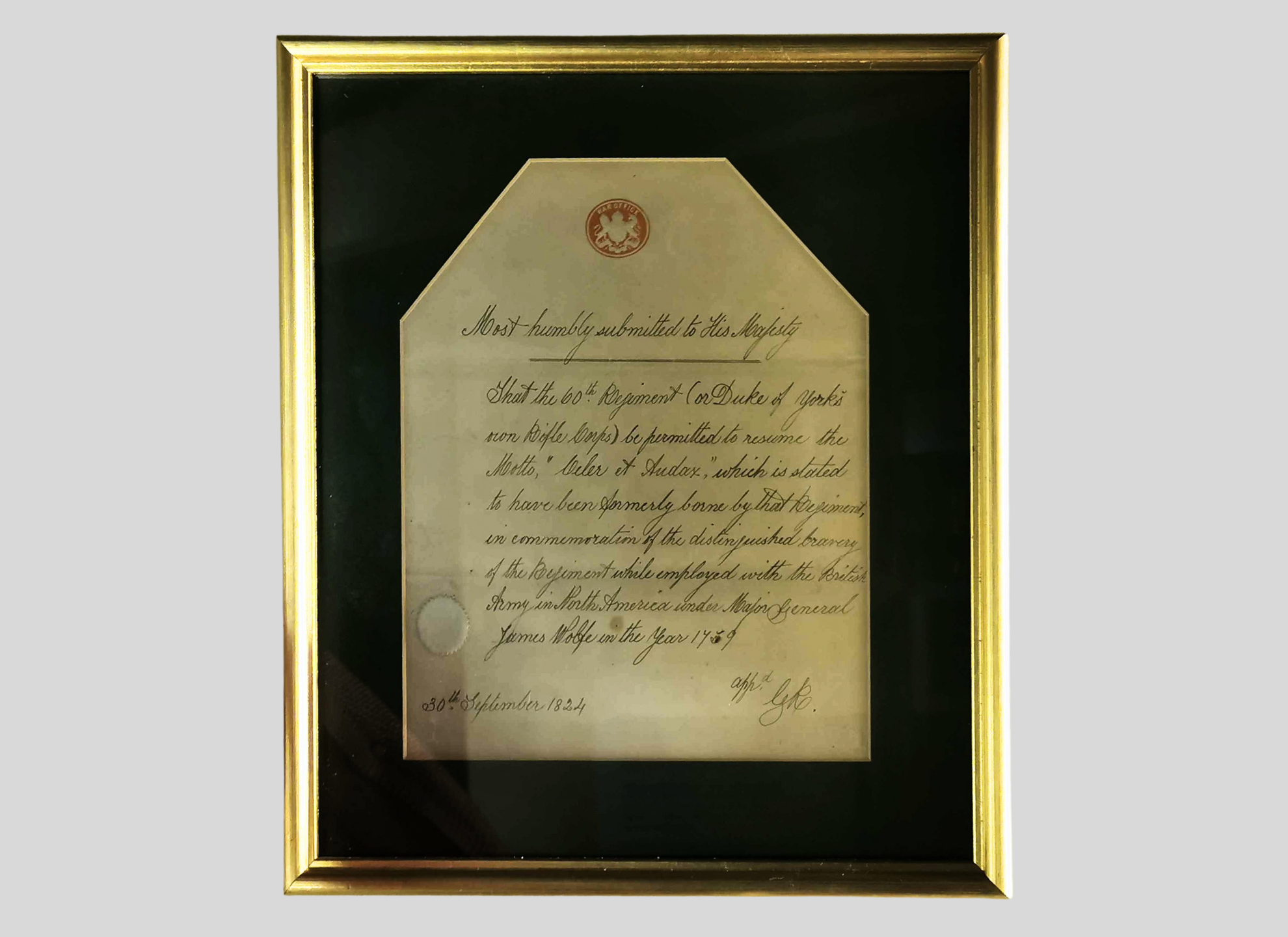 A photograph of a handwritten memorandum from 1824 concerning the regimental motto of the 60th (Duke of York's Own Rifle Corps).